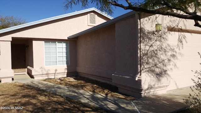 view of home's exterior featuring a garage