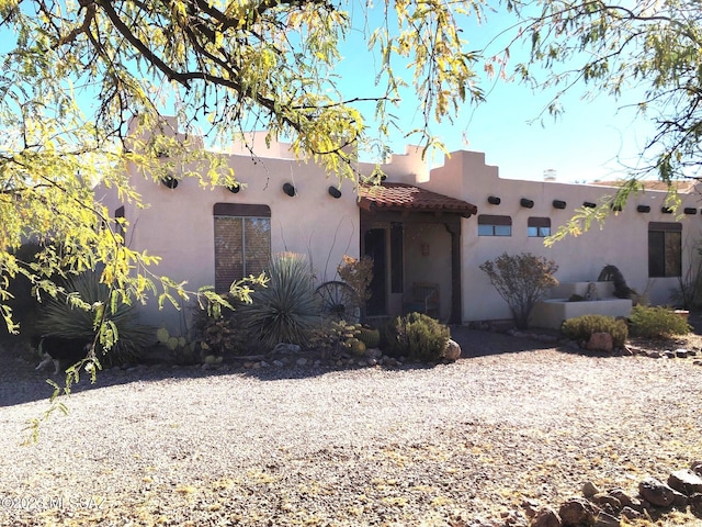 view of pueblo-style home