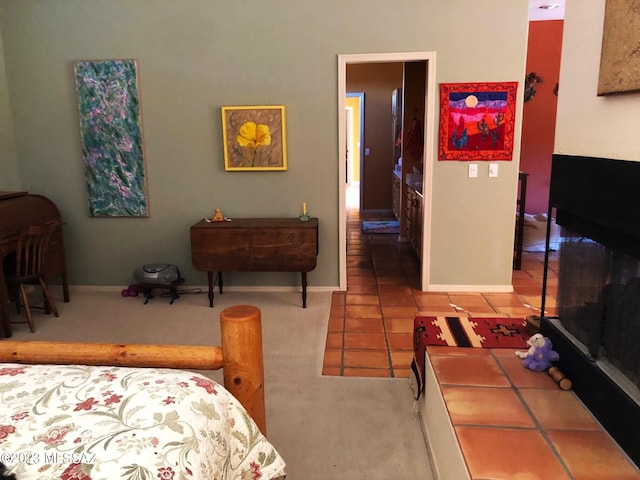 bedroom featuring light tile patterned flooring