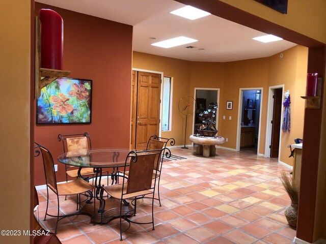 view of tiled dining space