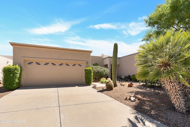 adobe home featuring a garage