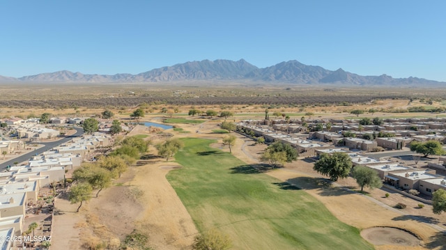 birds eye view of property featuring a mountain view