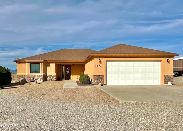 view of front of property featuring a garage