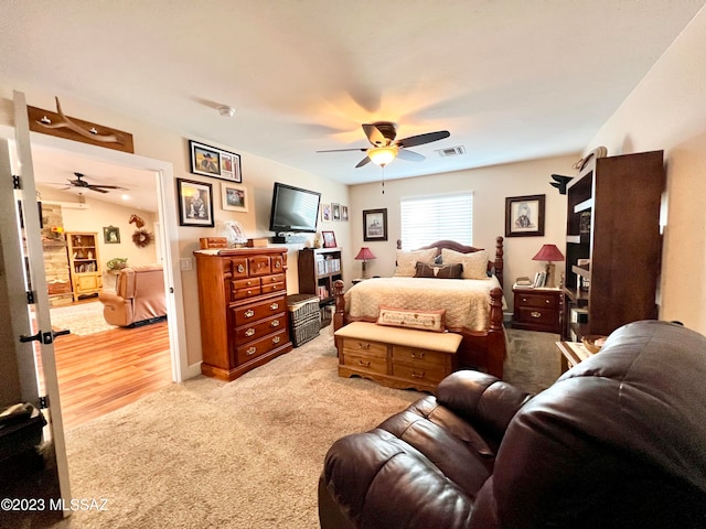 bedroom featuring light wood-type flooring and ceiling fan