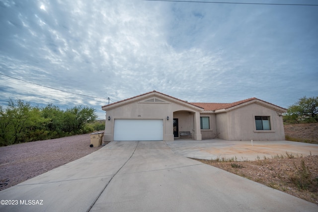 view of front of home with a garage