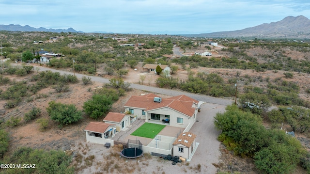 drone / aerial view featuring a mountain view