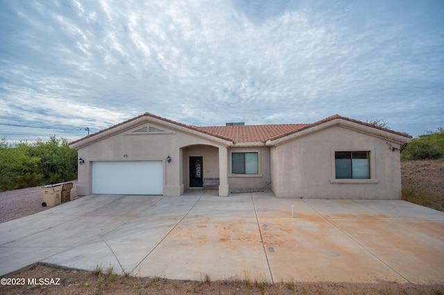 view of front of property featuring a garage