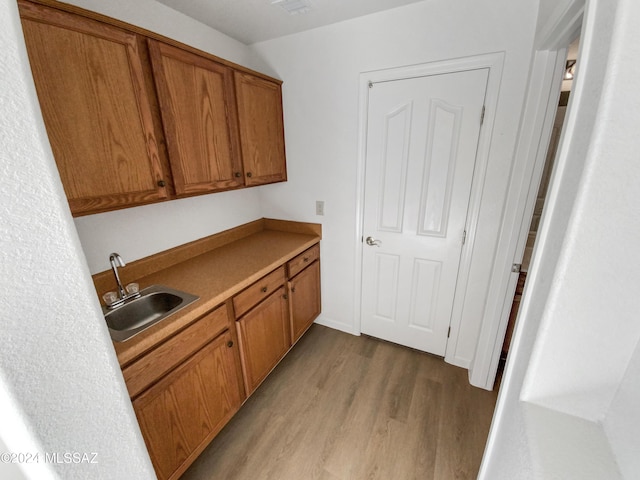 kitchen featuring sink and light hardwood / wood-style floors