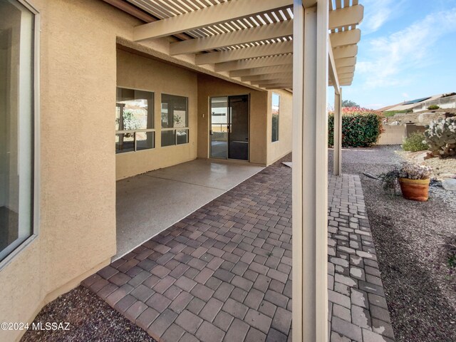 view of patio / terrace featuring a pergola