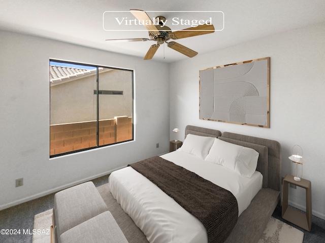 carpeted bedroom featuring ceiling fan