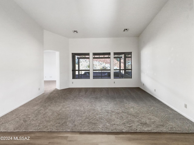 empty room featuring carpet floors