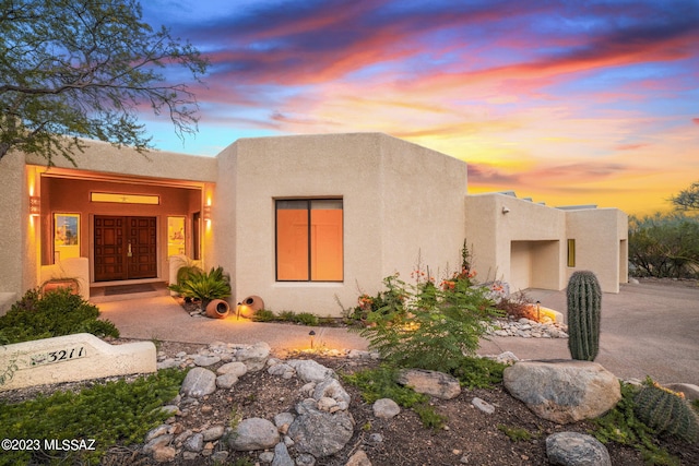 view of pueblo revival-style home