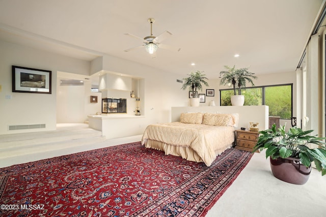 carpeted bedroom with ceiling fan