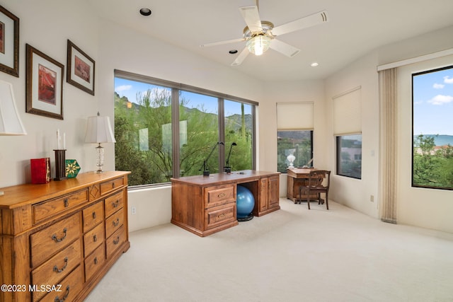 home office featuring ceiling fan and light colored carpet