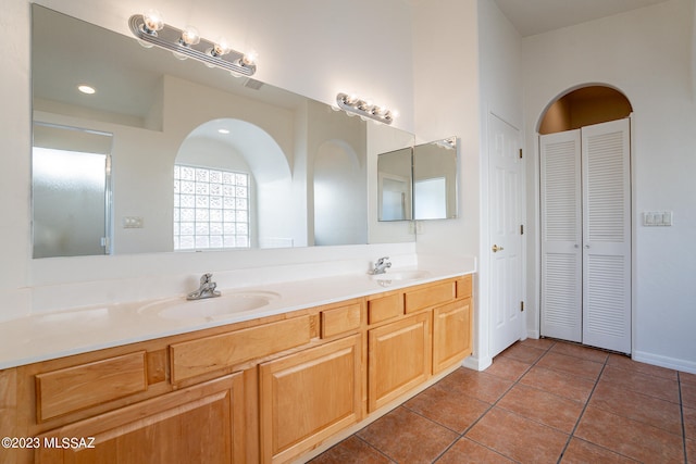 bathroom with vanity and tile patterned floors