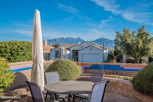 view of patio with a mountain view