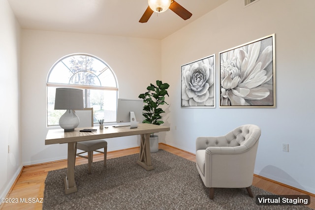 office space with ceiling fan and hardwood / wood-style flooring