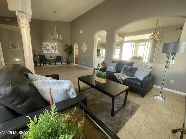 living room featuring an inviting chandelier and light tile patterned floors