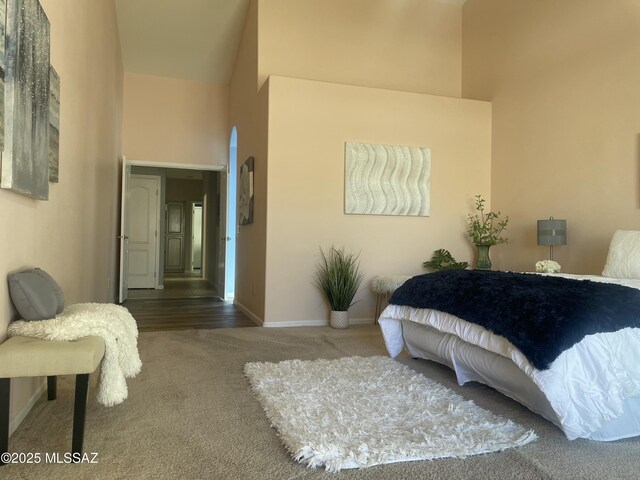 bathroom with toilet, a textured ceiling, a shower with door, and vanity