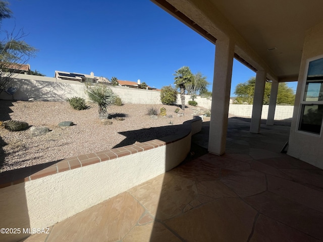 view of patio with a fenced backyard