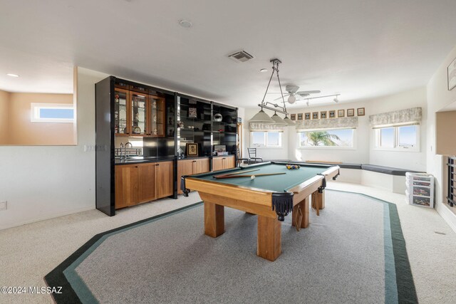 game room with billiards, sink, and light colored carpet