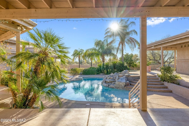 view of pool featuring a patio