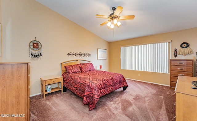 carpeted bedroom featuring ceiling fan and vaulted ceiling