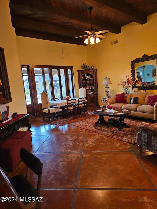 tiled living room featuring wooden ceiling, ceiling fan, and beamed ceiling