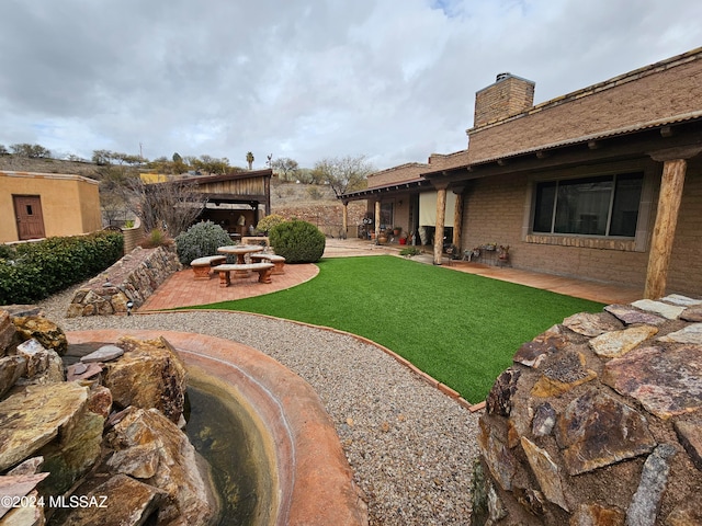 view of yard featuring a patio