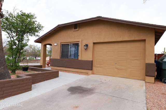 view of front of house with a garage