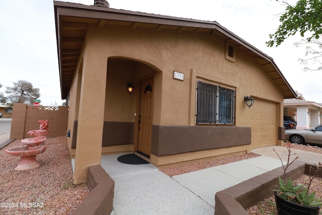 exterior space with a garage