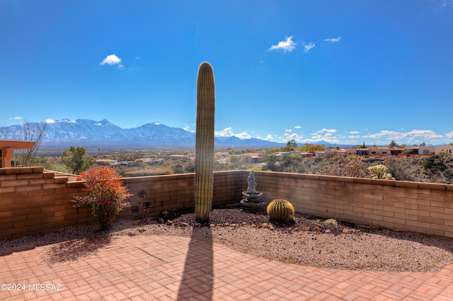 view of terrace featuring a mountain view