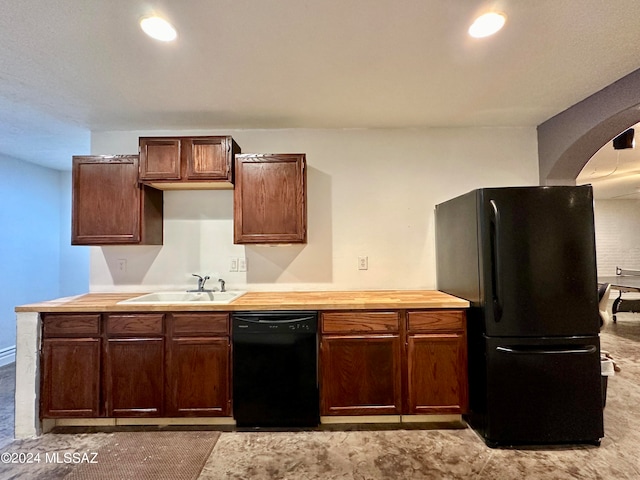 464 N 1st Ave, Thatcher, AZ 85552 - kitchen featuring butcher block counters, sink, and black appliances