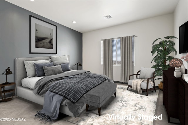 bedroom with recessed lighting and visible vents