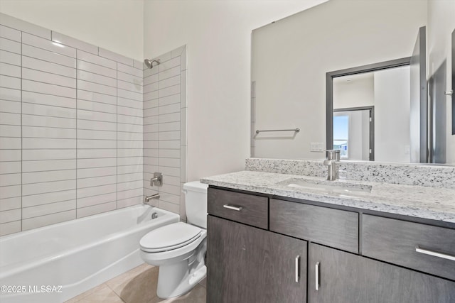 bathroom with shower / washtub combination, vanity, toilet, and tile patterned floors