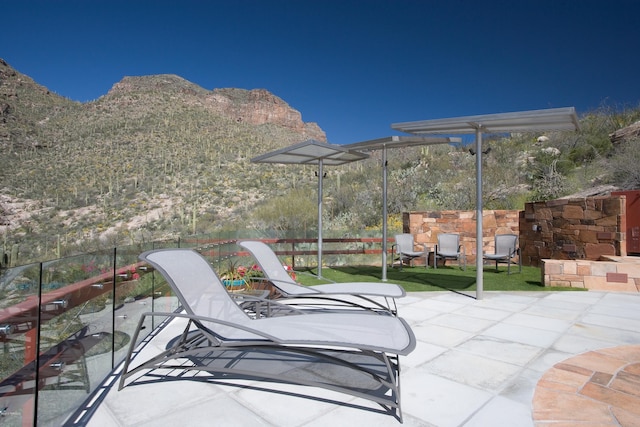 view of patio with a mountain view