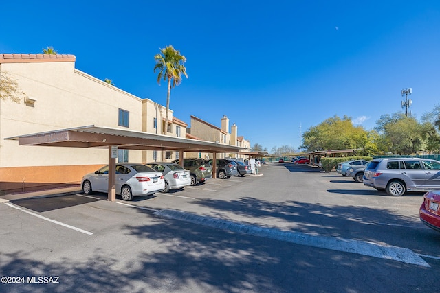 view of parking with a carport