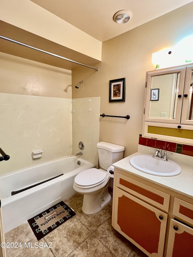 full bathroom featuring toilet, vanity, bathtub / shower combination, and tile patterned flooring