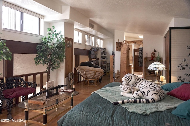 bedroom featuring a textured ceiling