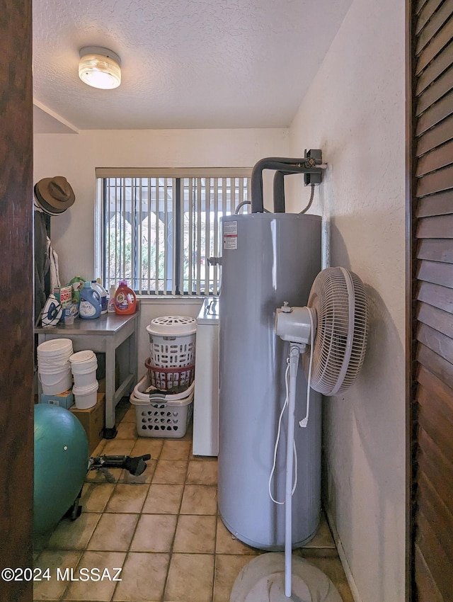 utility room featuring water heater