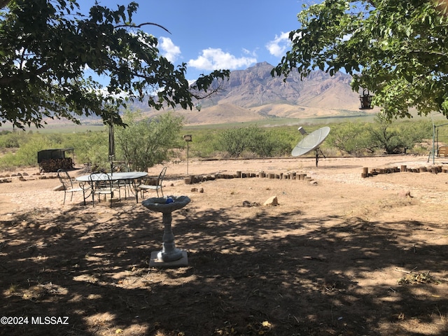 property view of mountains with a rural view