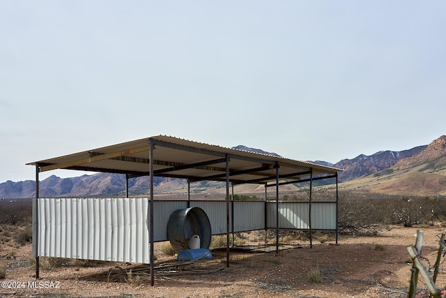 view of outbuilding featuring a mountain view