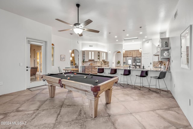 recreation room with ceiling fan, sink, light tile patterned floors, and pool table