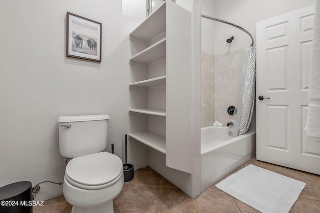 bathroom with toilet, shower / bath combo, and tile patterned floors