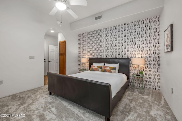 carpeted bedroom with ceiling fan