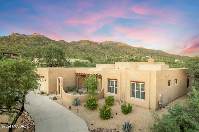 exterior space featuring a mountain view