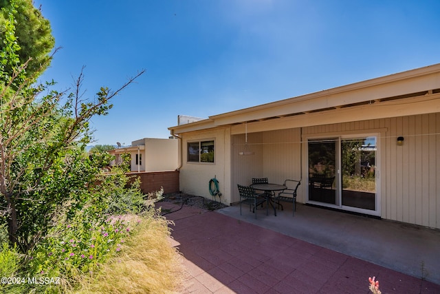 rear view of property with a patio area