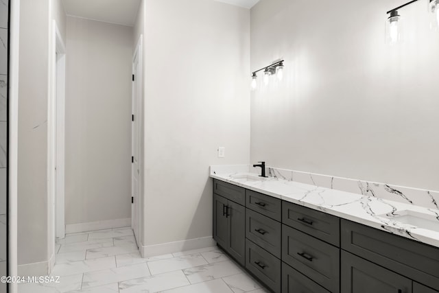 bathroom featuring tile floors and double sink vanity