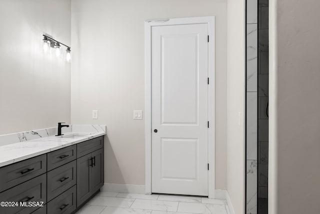 bathroom with double vanity and tile floors