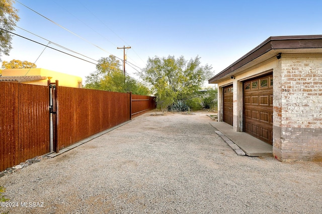 view of yard with a garage